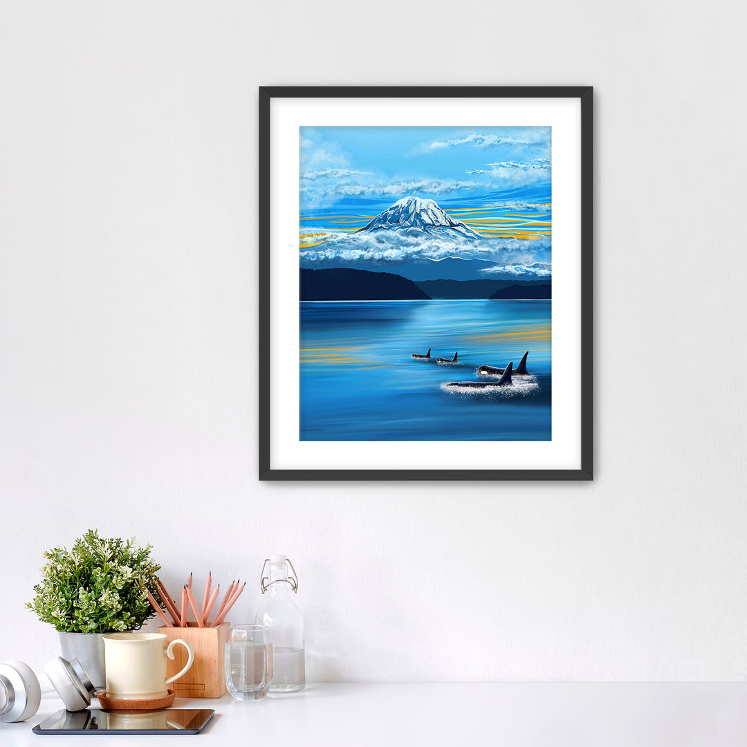 A Pod of Orcas swimming peacefully in The Puget Sound with Mount Rainier
